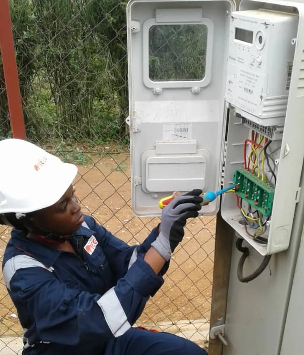 Woman working on meter-Rwanda-Power Africa