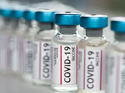 Closeup of vials of COVID-19 vaccines.