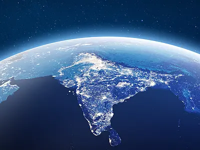 An illustration of India as seen by satellite at night.