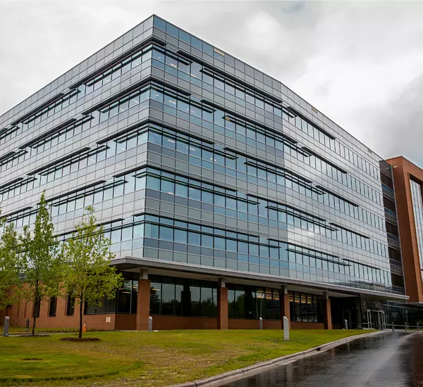 Exterior view of RTI's flagship Horizon building, which opened in 2018 on the Research Triangle Park campus.