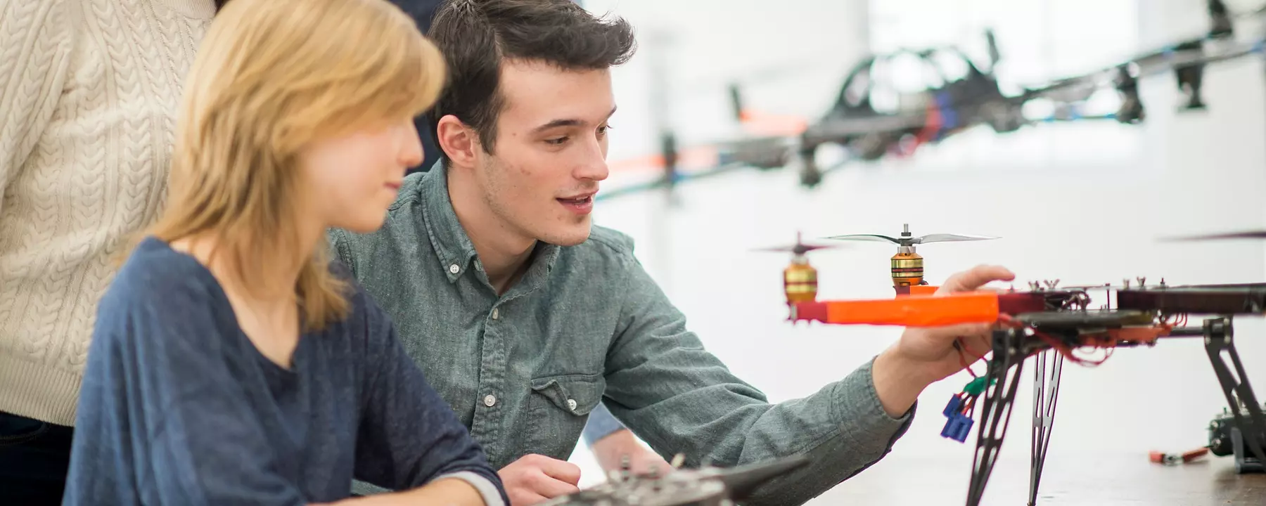Innovators work on a drone prototype