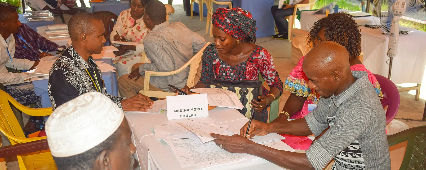 Partners meet at a Senegal GOLD forum to discuss priority investments for local communities.