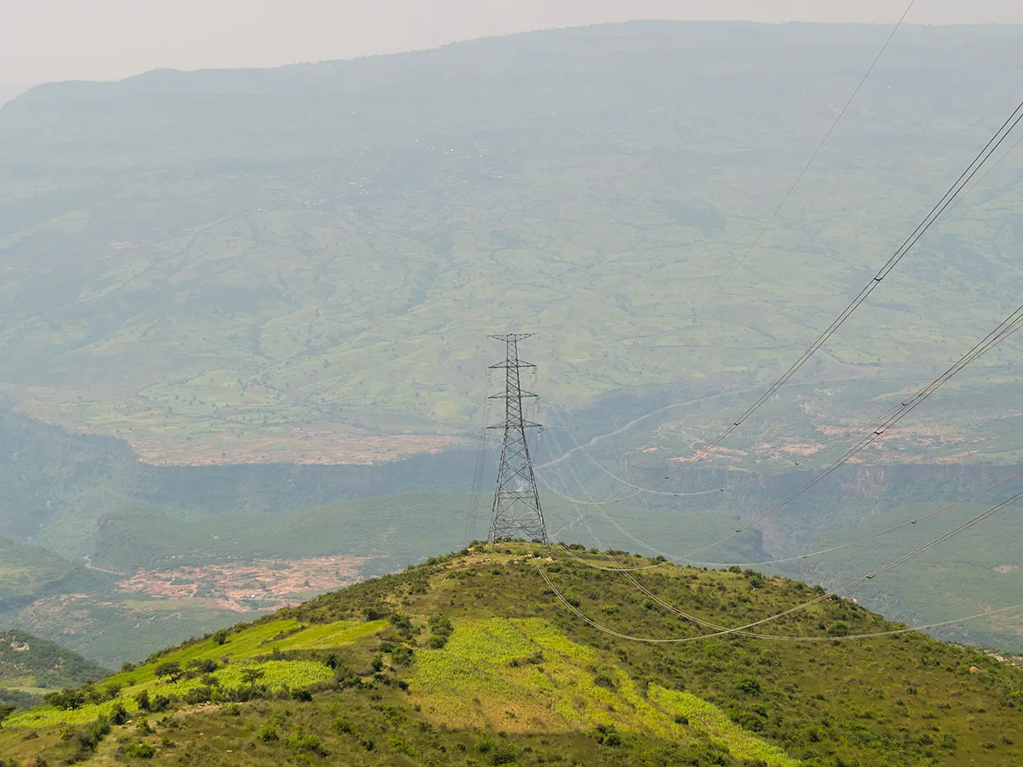 Power lines run across the hilly Amhara region of Ethiopia.