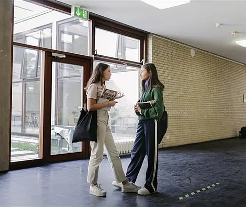 Students talking in hallway