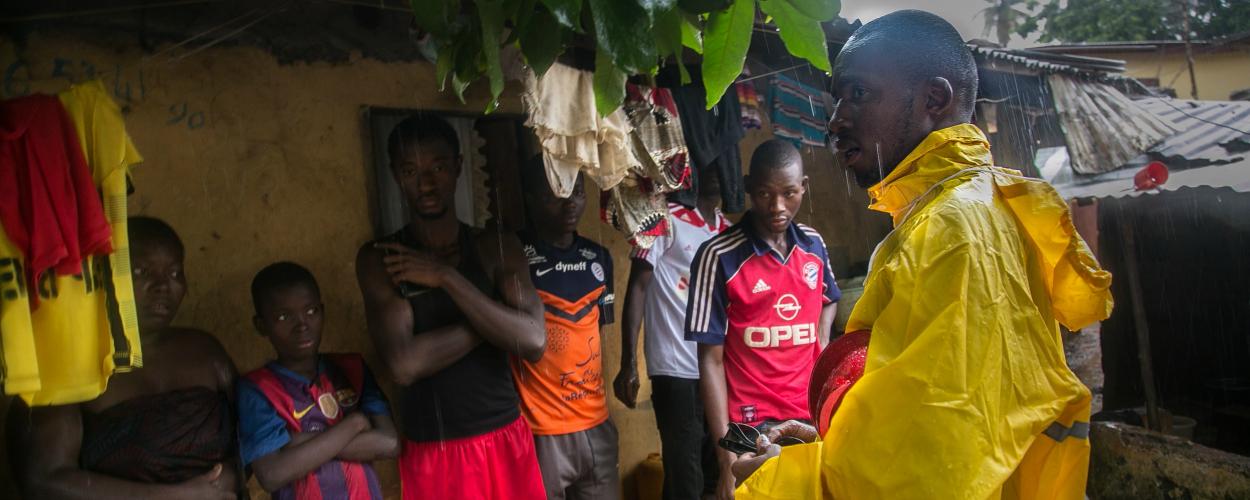 Community health worker conducts home visit in Matam Conakry, Guinea