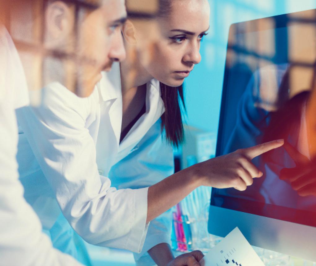 doctors looking at a computer screen